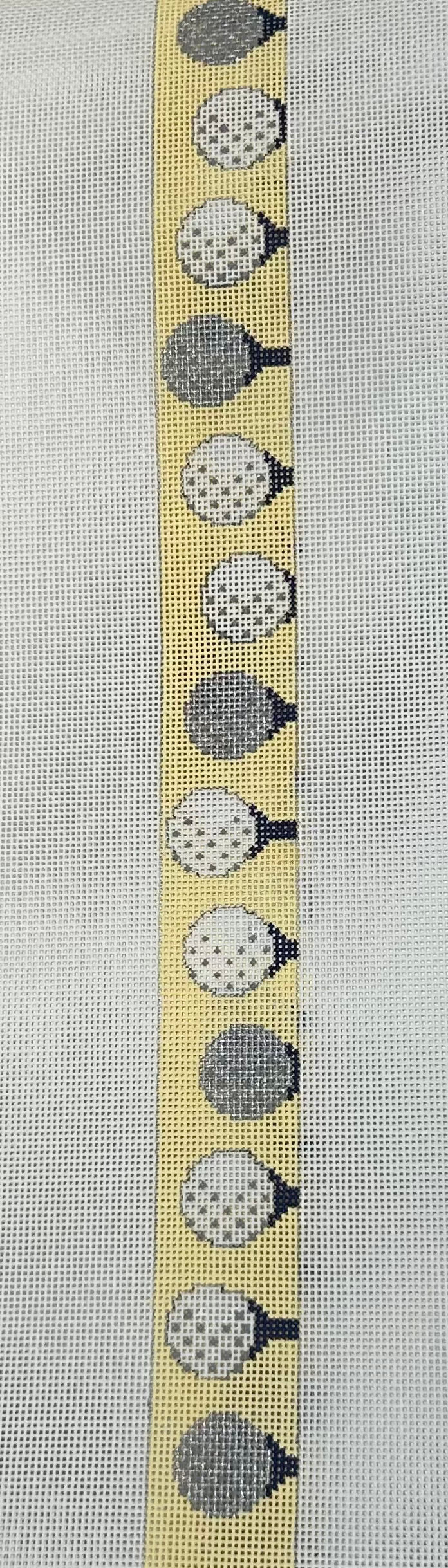 GOLF BALLS ON TEES - LIGHT BACKGROUND