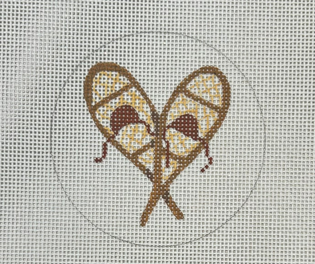 SNOWSHOES ON SPARKLY WHITE