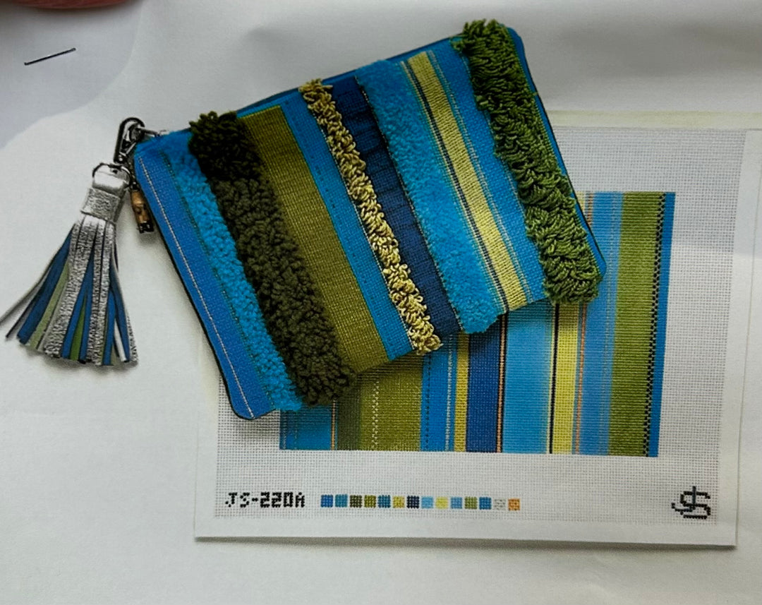 TUFTED STRIPE CLUTCH