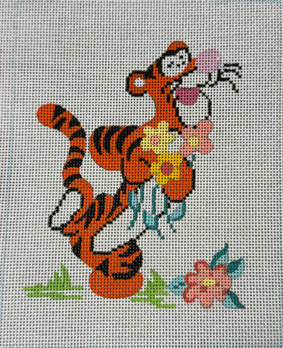 TIGGER HOLDING FLOWERS